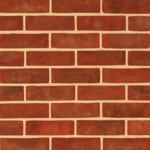 Hampton Multi handmade brick slips shown in a wall. The bricks have subtle colour variations and soft creases on the faces.
