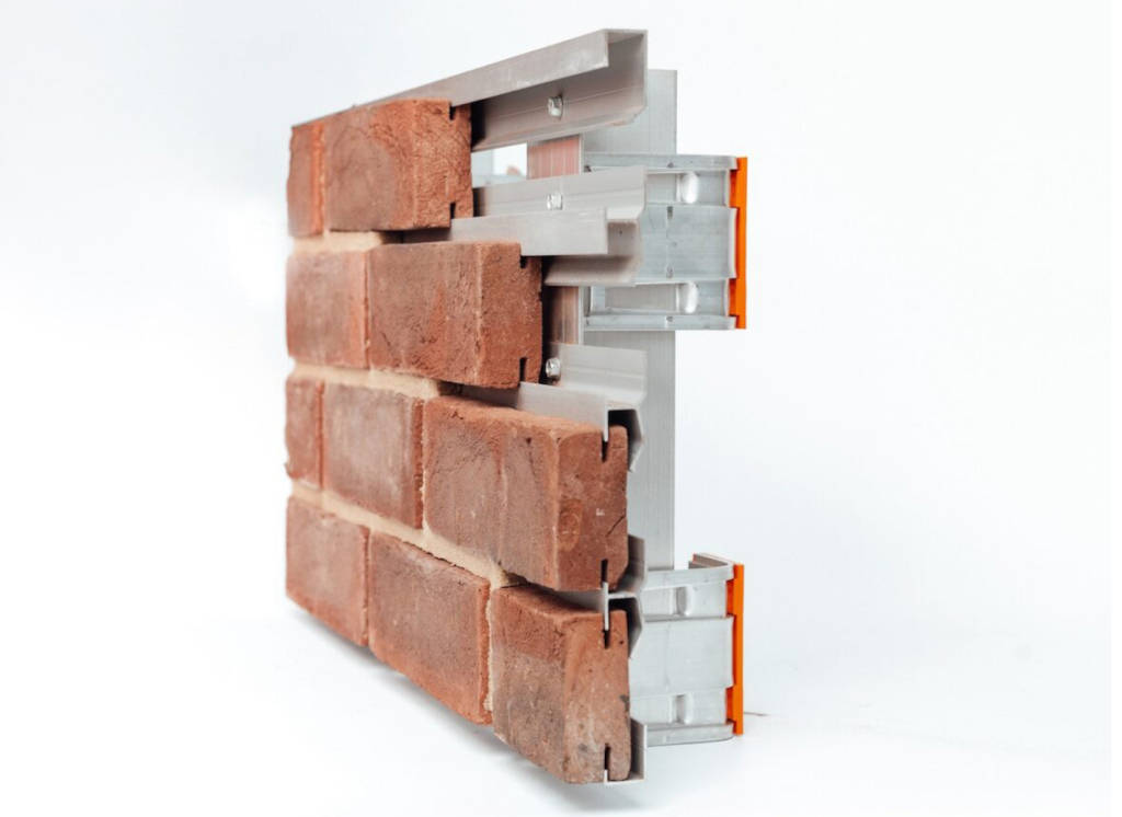 Example of a mechanical brick slip system using handmade bricks, shown from the side (profile view)..