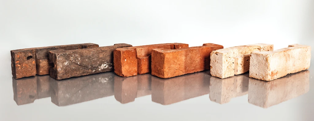 An example of grooved brick slips that can be cut and profiled for use with a precast cladding system.